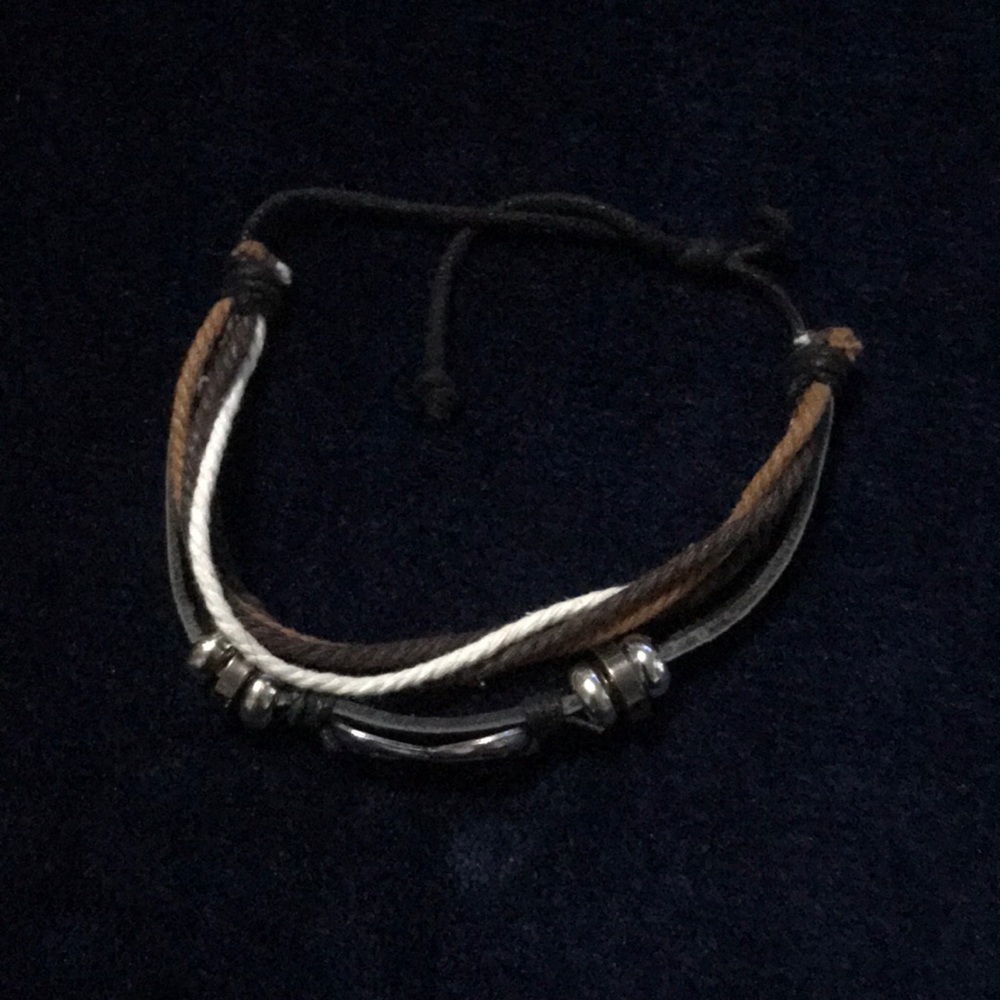 black, brown, white bracelet with infinity symbol